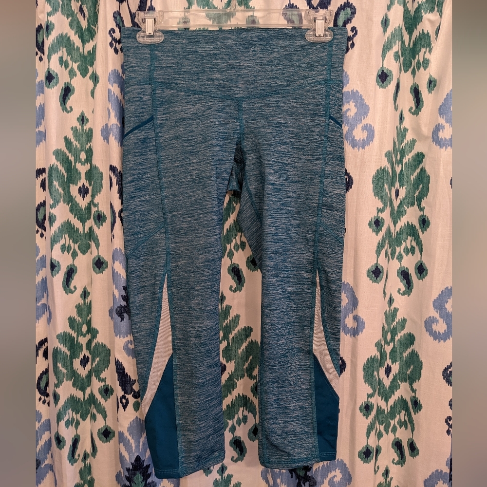 Teal Champion workout capris with thigh pocket
